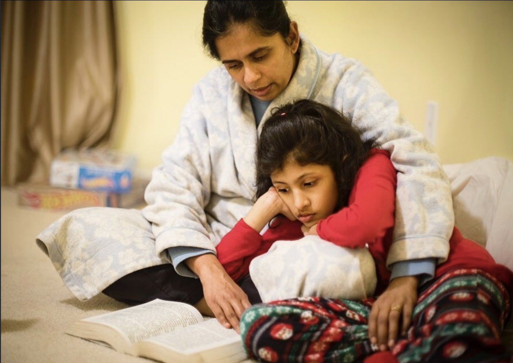 Amitha and Kriti reading at bedtime, Boston, 2011
