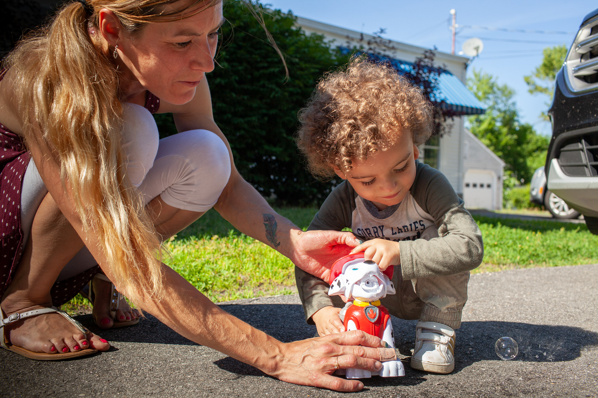 Cary and Tristin outside their home
