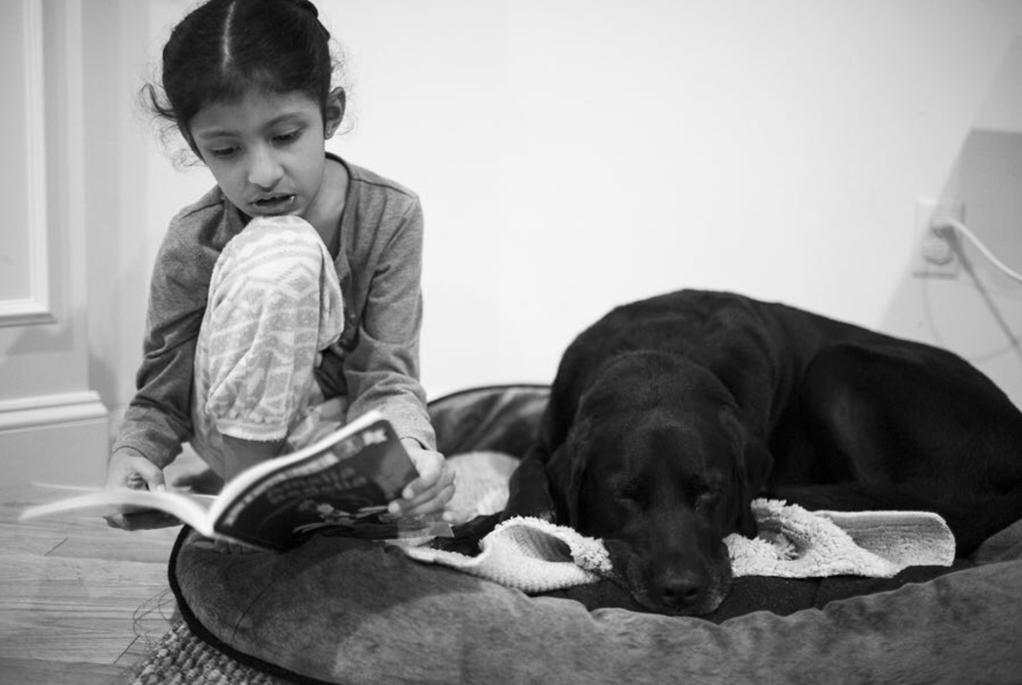 Kriti reading aloud to Bella, Boston, 2011