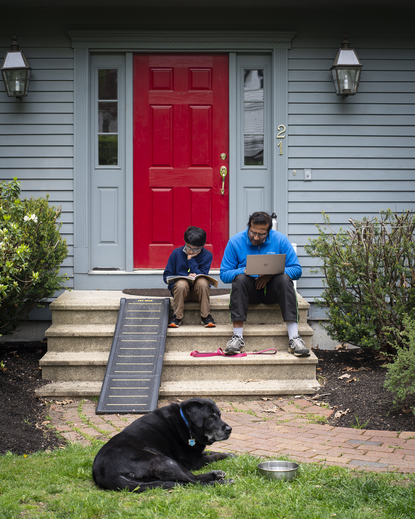 Front steps: Ajay working, Neel reading, Bella, Boston, 2020